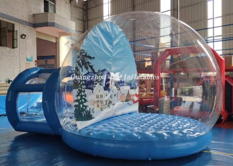 Inflatable snow globe attraction at an event